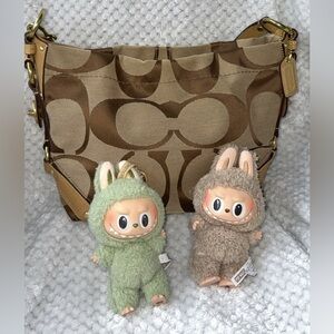 Medium tan coach Carly